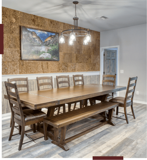 Dining room with wooden table and chairs.